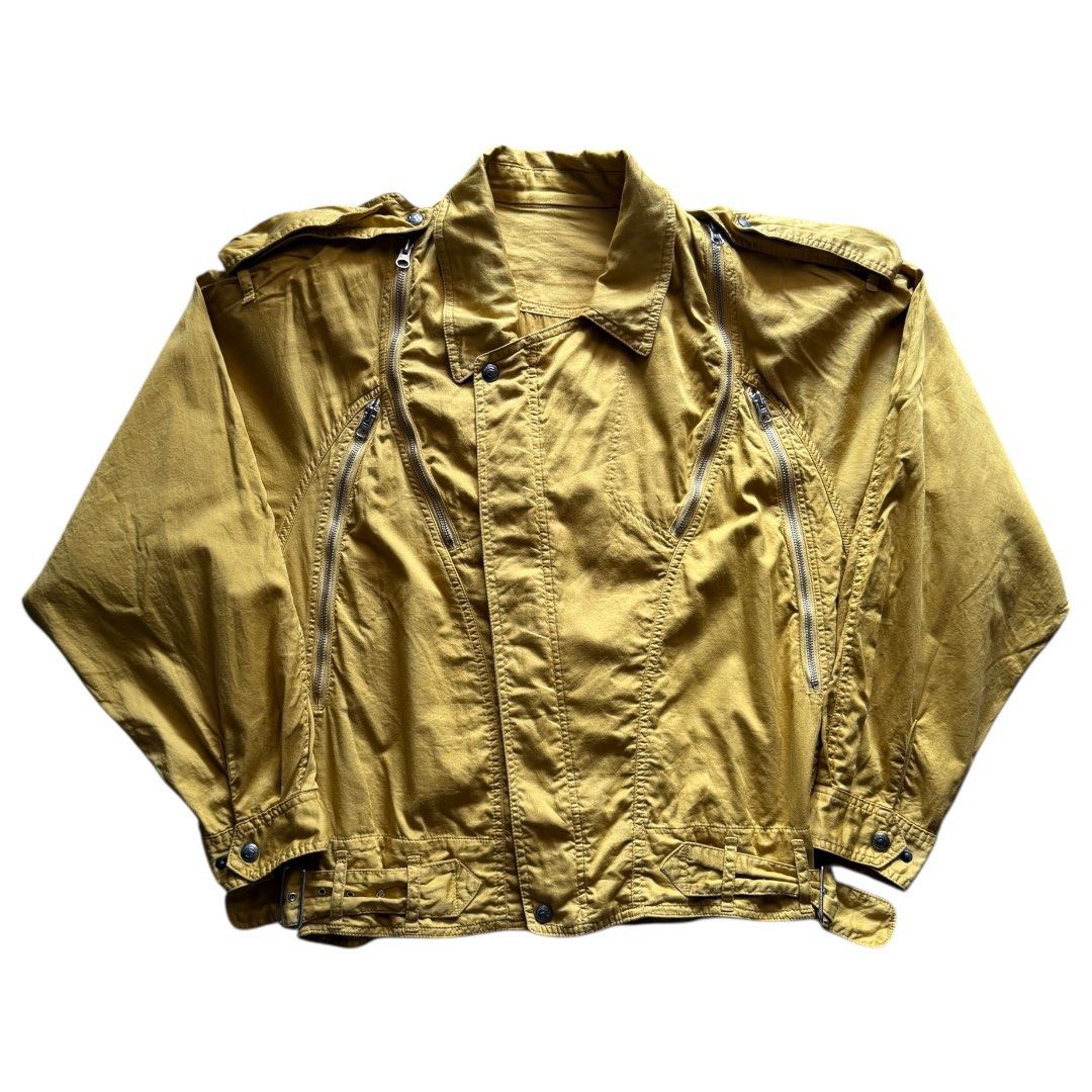 Vintage DiMaggio Japanese Utility Bomber Jacket (Category: Activewear) located in Zamboanga. Submitted by the.angura.store (Listing ID 1416028892, Image 1). Description: Vintage DiMaggio Japanese Utility Bomber Jacket This beautiful bomber jacket features multiple zippered pockets spread around the jacket that is very reminiscent of the Margiela 5-zip jacket. Cinched and snatched waist, double front closure (snap button/zipper) Detachable epaulet