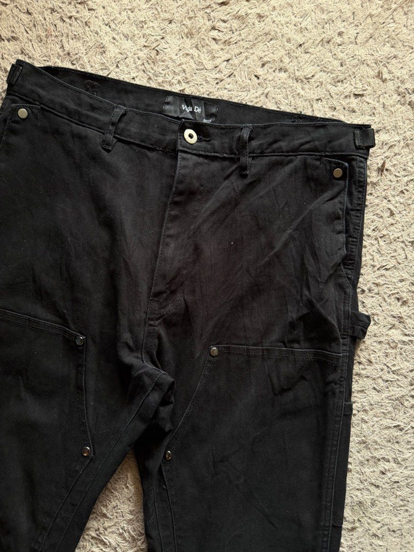 Vuja De Double Knee Flared Back-zip Carpenter Pants (Category: Jeans) located in Zamboanga. Submitted by the.angura.store (Listing ID 1416029083, Image 3). Description: Vuja De Double Knee Flared Back-zip Carpenter Pants Vuja De’s take on the iconic carpenter pants silhouette, it features double knee panel with metal rivets, cobrax snap on hand pocket. Waist adjuster with cinch, zippers at the back for style/fit adjustment. This is the cotton ver