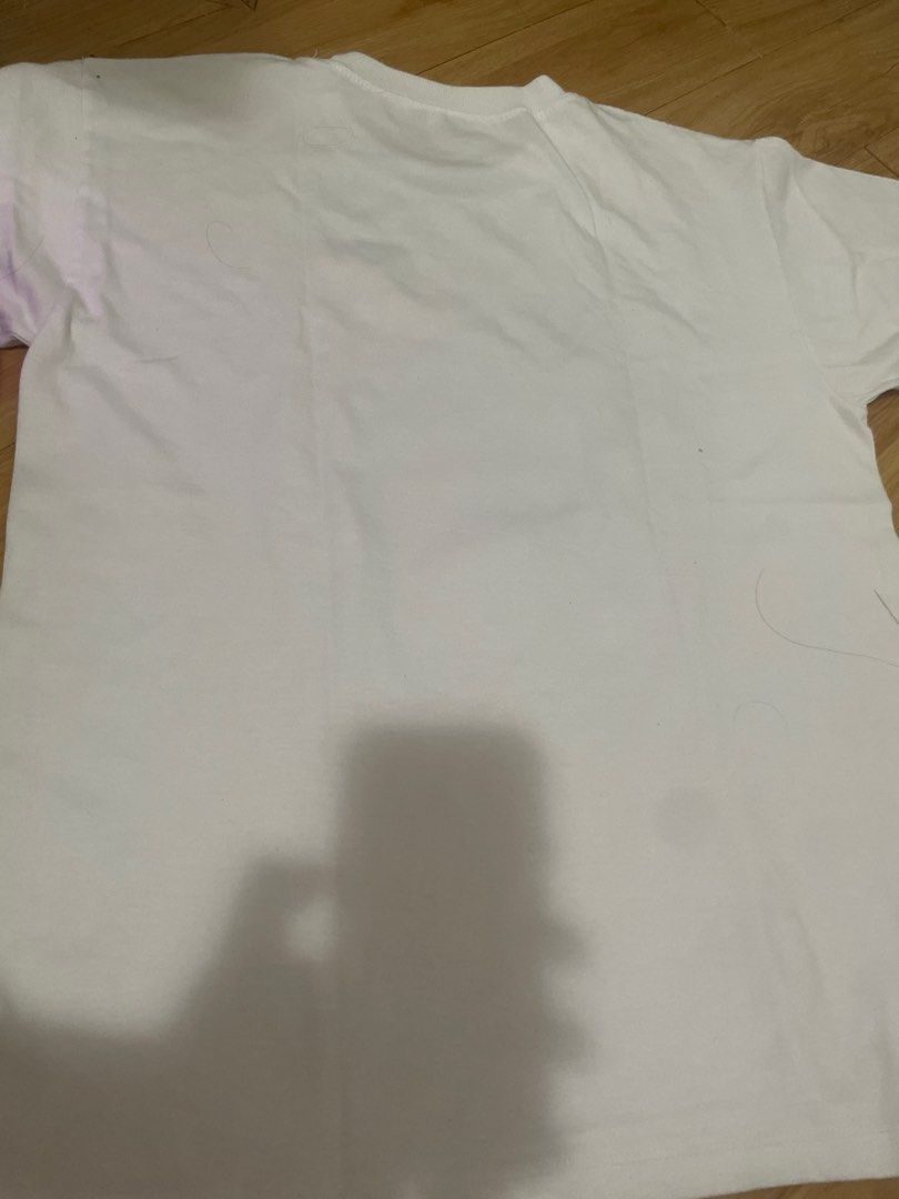 White Stay Present Graphic T-shirt (Category: Tshirts & Polo Shirts ) located in Manila. Submitted by kokocrunchmuncher (Listing ID 1416140684, Image 2). Description: - White t-shirt - Features a colorful "Stay Present" graphic - Graphic: Cartoon earth doing yoga - Crew neck - Short sleeves - Plain white back.