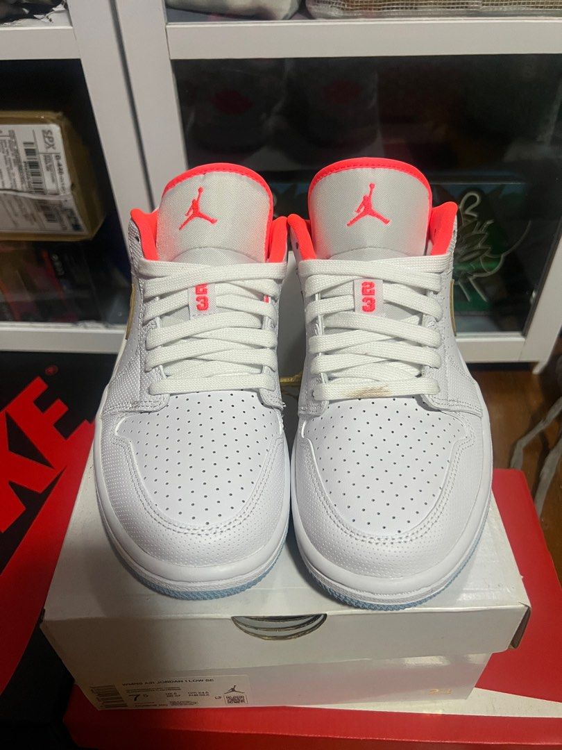 WMNS Air Jordan 1 Low SE (Category: Sneakers) located in Quezon City. Submitted by ammmilo (Listing ID 1416154103, Image 1). Description: - Air Jordan 1 Low SE sneakers - White upper with perforations - Gold swoosh - Coral-colored lining and accents - White midsole - Light blue outsole - Size: 7.5 US/ UK 5/ 24.5 cm - Includes original box Brand New, Unfitted (Dead stock) RFS: previously collecting, downsizing home Bought at SRP 5,500 Initially se