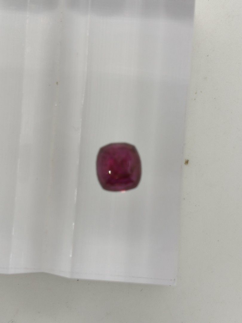 2.40cts Ruby (Category: Precious Stones) located in Singapore. Submitted by angmokio7921 (Listing ID 1416297466, Image 3). Description: Item: Ruby Wt: 2.40cts Color: Vivid Red Dim: 7.30*6.79*5.12mm Shape: Rectangle cushion cut COO: Mozambique Cert: CGL Comments: No indication of heating.