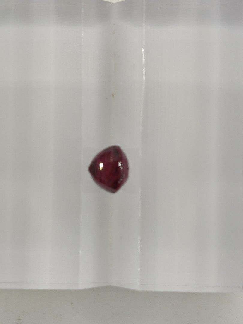 2.40cts Ruby (Category: Precious Stones) located in Singapore. Submitted by angmokio7921 (Listing ID 1416297466, Image 2). Description: Item: Ruby Wt: 2.40cts Color: Vivid Red Dim: 7.30*6.79*5.12mm Shape: Rectangle cushion cut COO: Mozambique Cert: CGL Comments: No indication of heating.