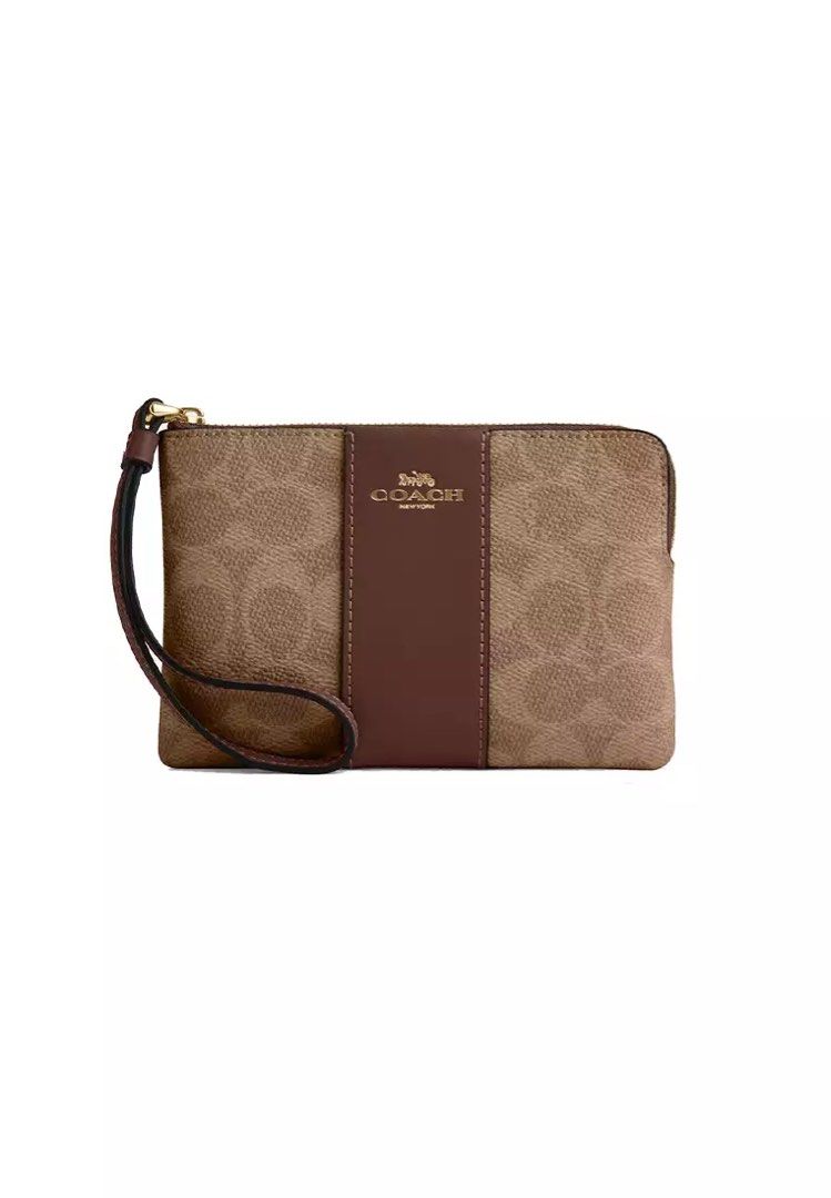 Authentic COACH Corner Zip Wristlet (Gold/Tan/Brown) (Category: Luxury Bags & Wallets) located in Quezon City. Submitted by chiuxchan (Listing ID 1416376356, Image 1). Description: Authentic Coach Corner Zip Wristlet Color: Gold/Tan/Brown Measurements (LxHxW): 6.25” x 4.00” x 0.50” Features: Wrist strap attached, zip-top closure Materials: Signature patent leather, smooth leather, fabric lining Bought directly from Coach Outlet Japan.