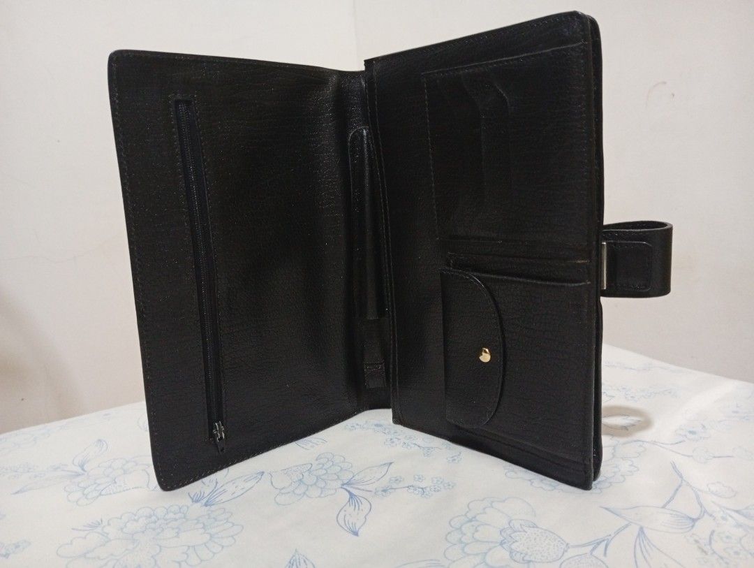 Bally Black Leather Clutch (Category: Luxury Bags & Wallets) located in Quezon City. Submitted by mcenon35 (Listing ID 1416364343, Image 2). Description: - Authentic Bally clutch - Black leather exterior - Gold-tone clasp - Gold Bally logo inside - Interior: Multiple compartments, zippered pocket, card slots, and snap closure pocket - Made in Italy.