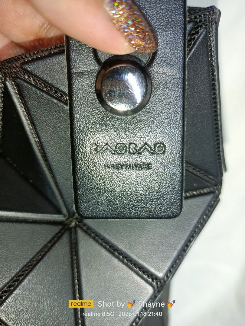 Baobao Issey Miyake Lucent Matte Black Tote (Category: Luxury Bags & Wallets) located in Bolinao. Submitted by shayne_0215 (Listing ID 1416388540, Image 2). Description: Authentic Japan Source Only has one missing rivet (see 3rd pic) MOP: GCASH.
