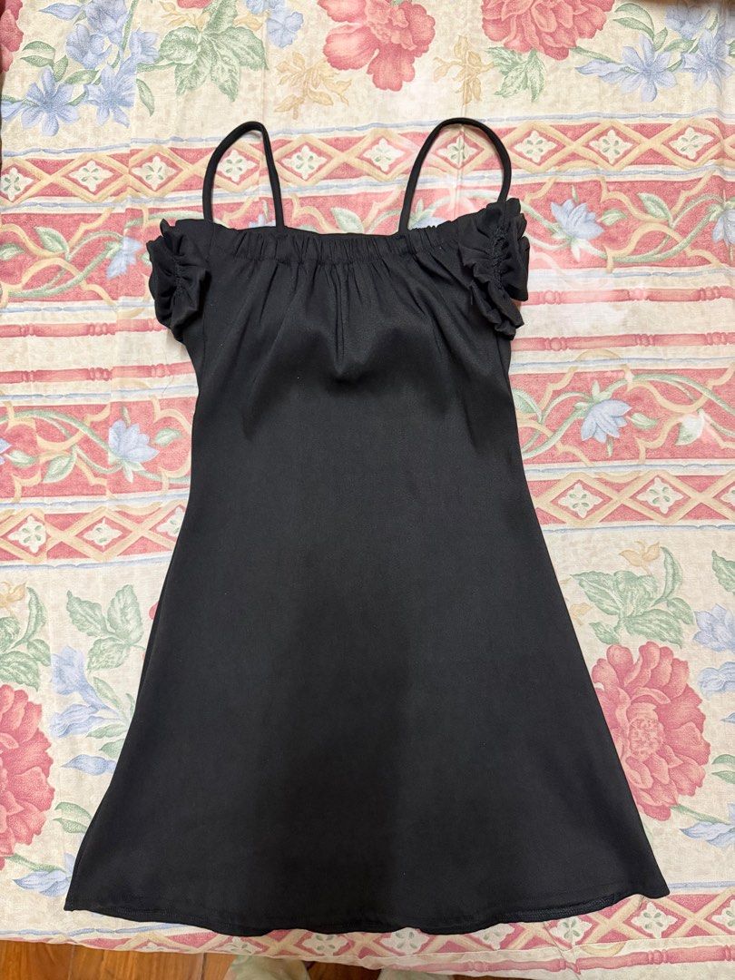 Black flower mini dress (free size) (Category: Dresses) located in Manila. Submitted by tltdeclutters (Listing ID 1416416604, Image 2). Description: - Brand new! Never worn - Bought for ₱269 on tiktok shop - RFS: Too small on me - Free size - Stretchable and garterized in the chest area - Thick material - Payment: GCASH or BPI.