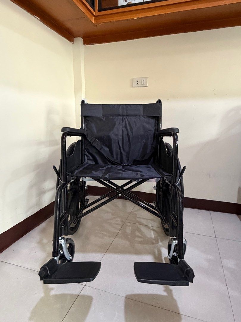 Black Wheelchair (Category: Wheelchairs) located in Cainta. Submitted by reabilty (Listing ID 1416237206, Image 1). Description: - Black foldable wheelchair - Includes footrests and armrests - Comfortable black fabric backrest - Provides mobility assistance.
