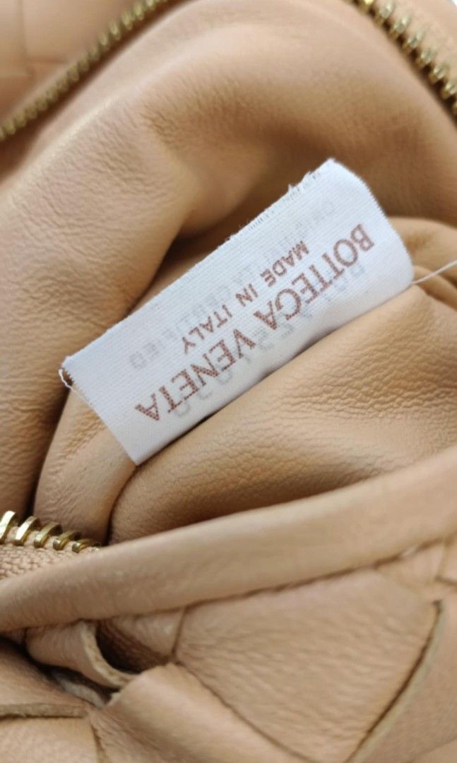 Bottega Veneta Mini Jodie (Category: Luxury Bags & Wallets) located in Legazpi City. Submitted by georgepine07142 (Listing ID 1416280141, Image 3). Description: Preloved Bottega Veneta Mini Jodie Leather Handbag – Almond Crafted from Bottega Veneta’s signature intrecciato leather in a beautiful almond shade. This Mini Jodie is compact yet stylish, perfect for elevating both casual and dressy looks. Soft leather, iconic knotted handle, and timeles