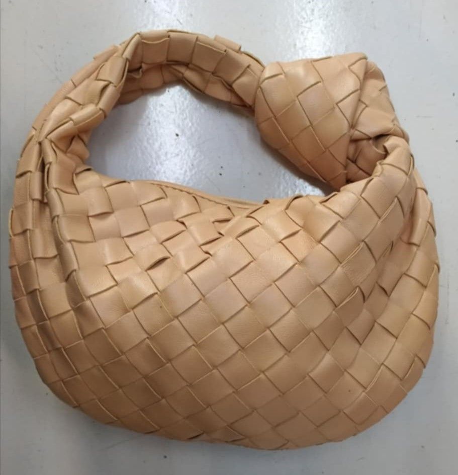 Bottega Veneta Mini Jodie (Category: Luxury Bags & Wallets) located in Legazpi City. Submitted by georgepine07142 (Listing ID 1416280141, Image 1). Description: Preloved Bottega Veneta Mini Jodie Leather Handbag – Almond Crafted from Bottega Veneta’s signature intrecciato leather in a beautiful almond shade. This Mini Jodie is compact yet stylish, perfect for elevating both casual and dressy looks. Soft leather, iconic knotted handle, and timeles