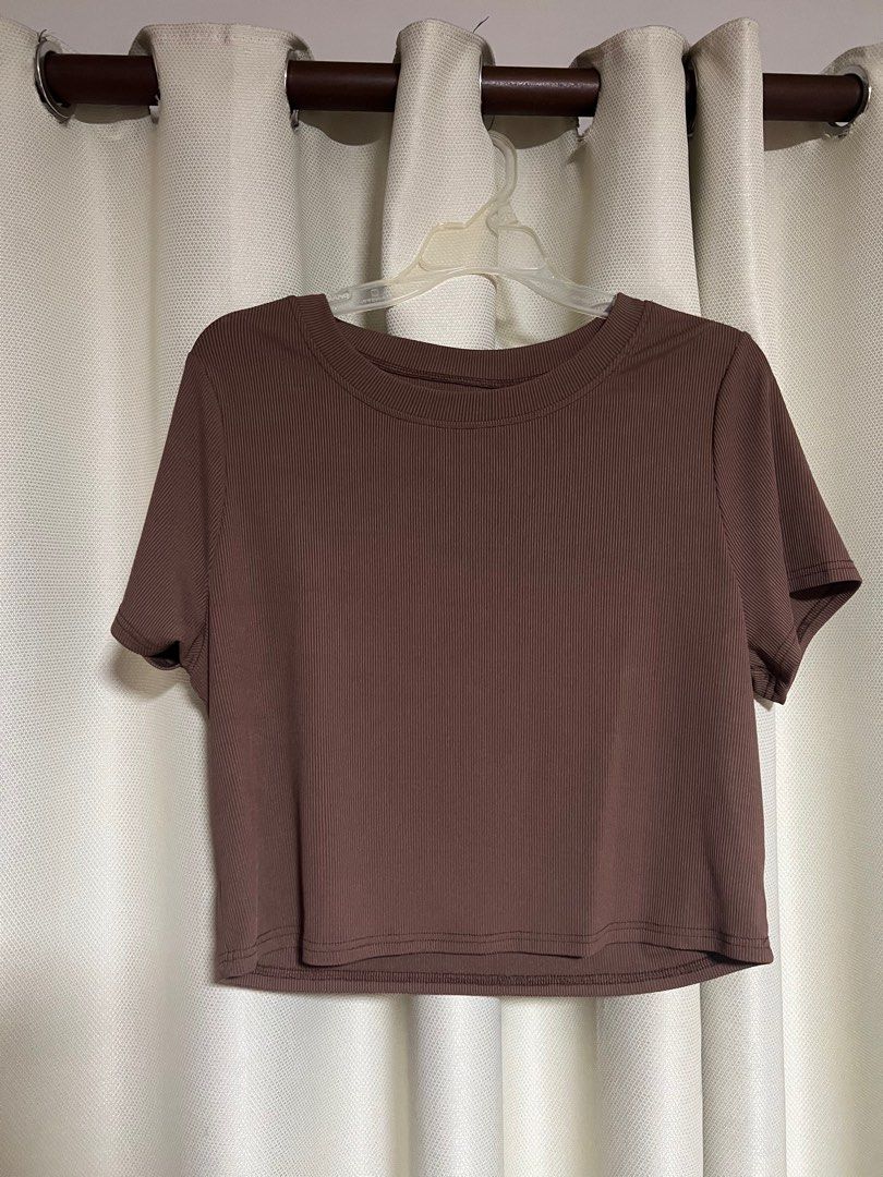 Brown Ribbed Top (Category: Others Tops) located in Makati City. Submitted by helpmedeclutter03 (Listing ID 1416273607, Image 1). Description: - Shein - Size: XL - Cropped but not too short. Fit is comfy - Color is accurate as in pic - Pairs well with high-waisted bottoms!! - Used once, no damage.