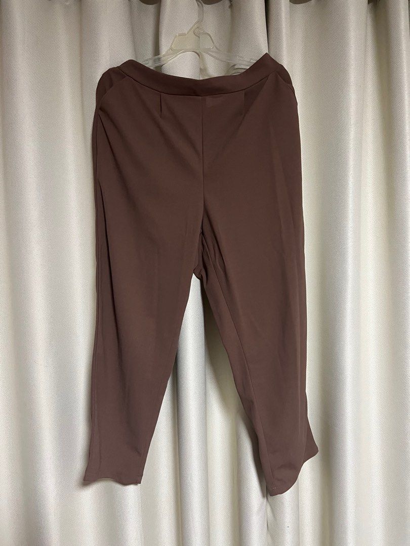 Brown Wide Pants (Category: Other Bottoms) located in Makati City. Submitted by helpmedeclutter03 (Listing ID 1416272479, Image 1). Description: - Shein Curve - Size: 0XL (Garterized, can fit XL/1XL/2XL) - Has pockets - Never used - Super nice quality RFS Decluttering.
