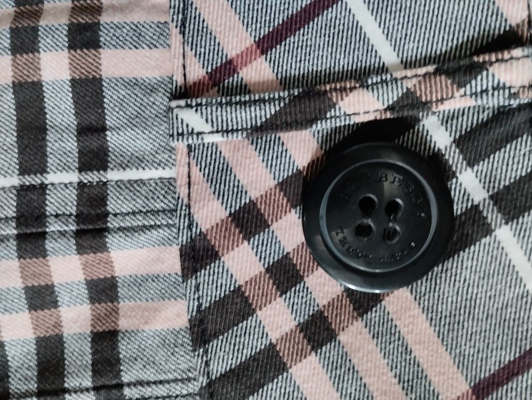 Burberry Plaid Pleated Skirt (Category: Skirts) located in Mabalacat. Submitted by uniqlover (Listing ID 1416266998, Image 3). Description: - Pleated design zipper closure - Solid-colored lining - Brand tag visible.