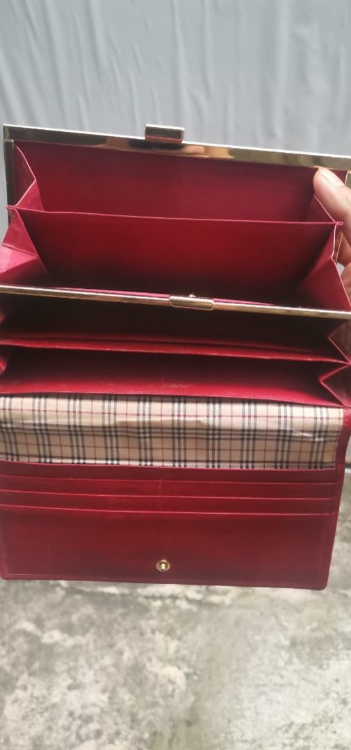 Burberry Red Leather Wallet (Category: Luxury Bags & Wallets) located in Quezon City. Submitted by akosiahcap95300 (Listing ID 1416430004, Image 3). Description: - Authentic Burberry red leather wallet - Multiple compartments for cards and cash - Classic Burberry check lining - Secure snap closure - Stylish kiss-lock closure - Crafted from premium leather.