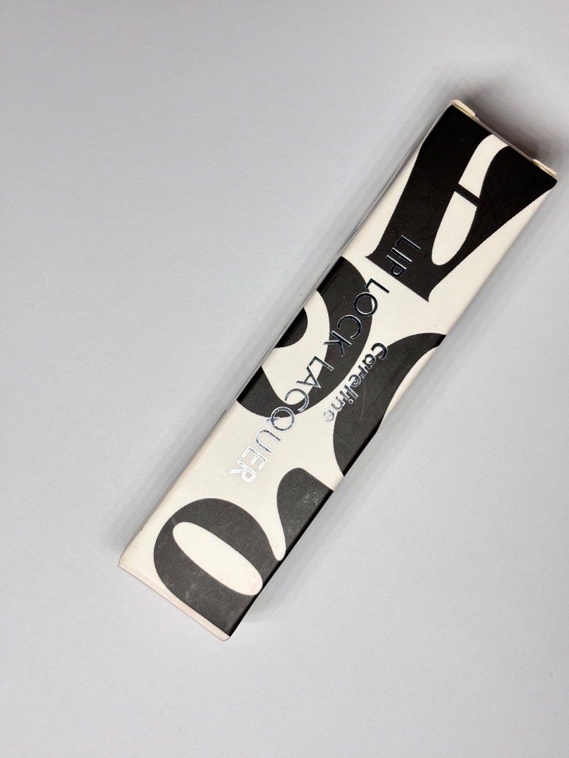 Careline Lip Lock Lacquer - Diplomats (Category: Makeup) located in Talisay. Submitted by leles.things (Listing ID 1416317839, Image 1). Description: - Careline Lip Lock Lacquer - Shade: Diplomats - New, in original packaging - Box design: Black and white with Careline logo - Shade name indicated on a pink sticker.