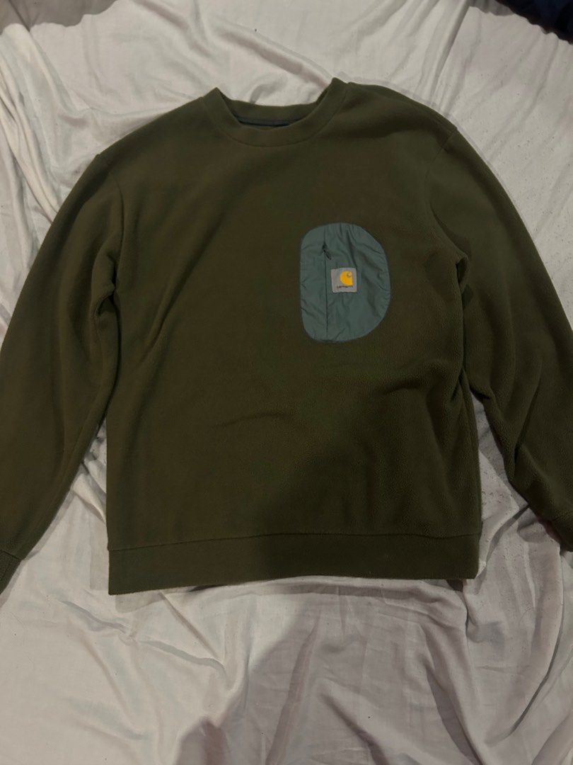 Carhartt Pocket Fleece Sweater (Category: Coats, Jackets and Outerwear) located in San Jose del Monte. Submitted by niv2x (Listing ID 1416363913, Image 1). Description: Width: 21 Length: 26.5 - Carhartt Pocket Fleece Sweater - Olive green color - In good condition.