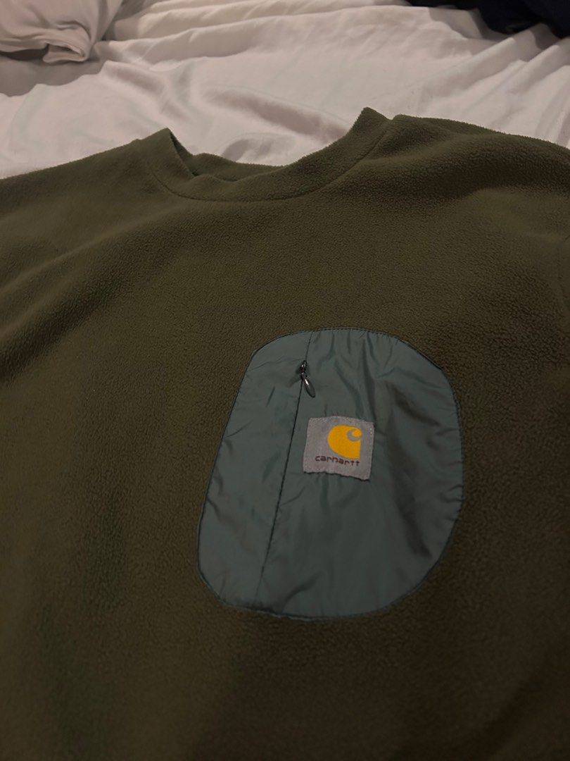 Carhartt Pocket Fleece Sweater (Category: Coats, Jackets and Outerwear) located in San Jose del Monte. Submitted by niv2x (Listing ID 1416363913, Image 2). Description: Width: 21 Length: 26.5 - Carhartt Pocket Fleece Sweater - Olive green color - In good condition.
