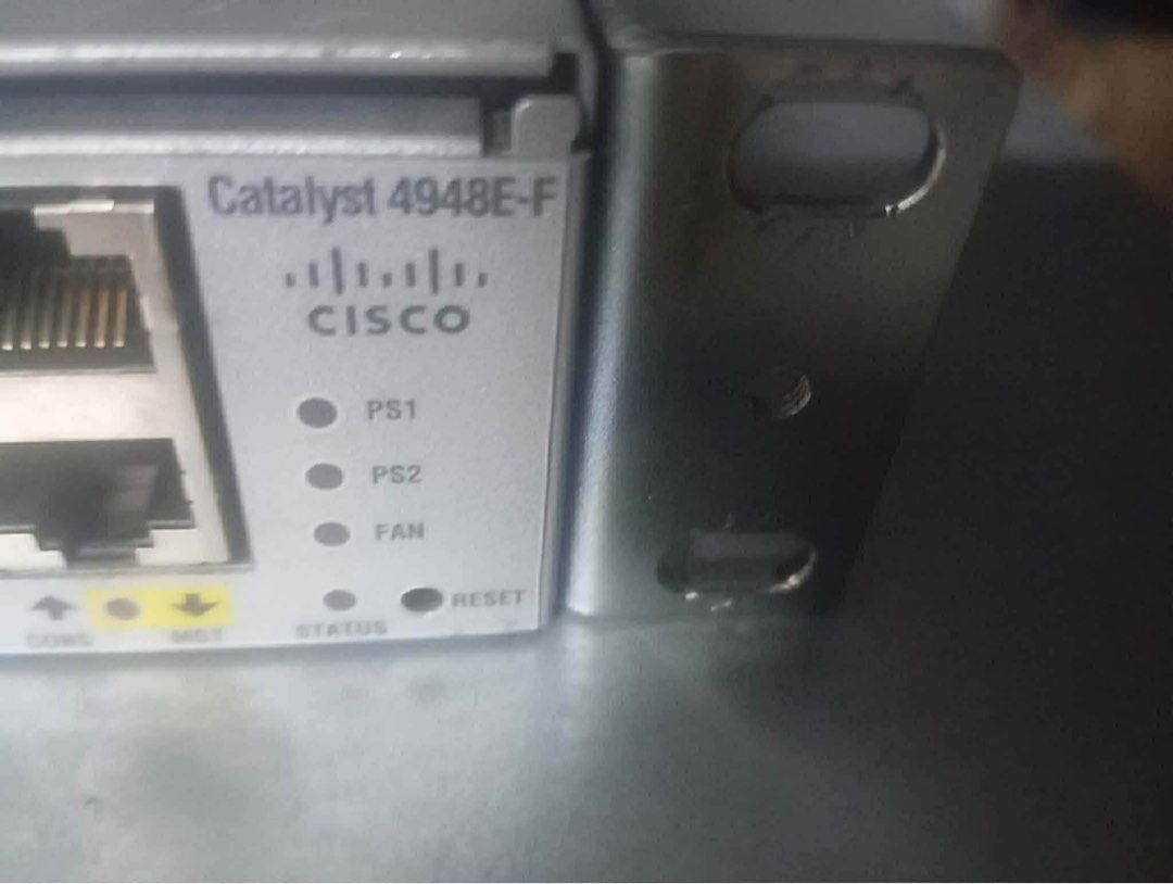 Cisco Catalyst 4948E-F Switch (Category: Networking) located in Makati City. Submitted by myapplegates (Listing ID 1416390048, Image 1). Description: - Cisco Catalyst 4948E-F switch - Multiple Ethernet ports - Power supply status indicator - Fan status indicator - Reset button - Visible model number - Silver color.