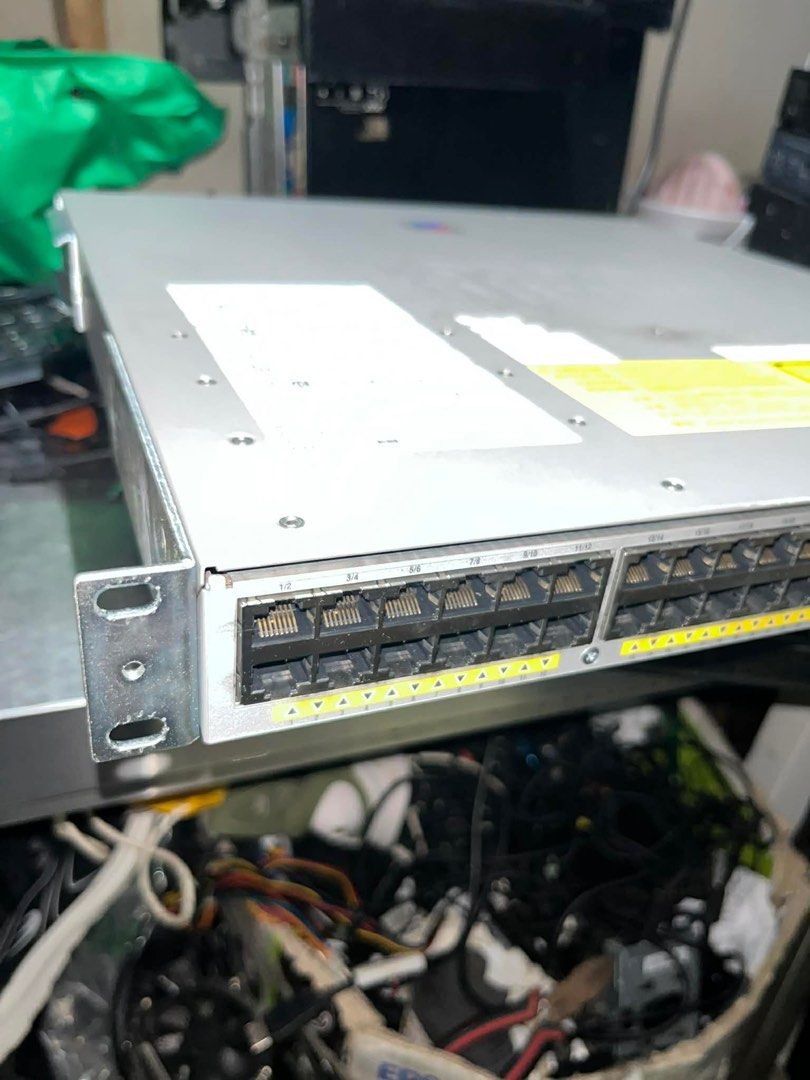 Cisco Catalyst 4948E-F Switch (Category: Networking) located in Makati City. Submitted by myapplegates (Listing ID 1416390048, Image 2). Description: - Cisco Catalyst 4948E-F switch - Multiple Ethernet ports - Power supply status indicator - Fan status indicator - Reset button - Visible model number - Silver color.