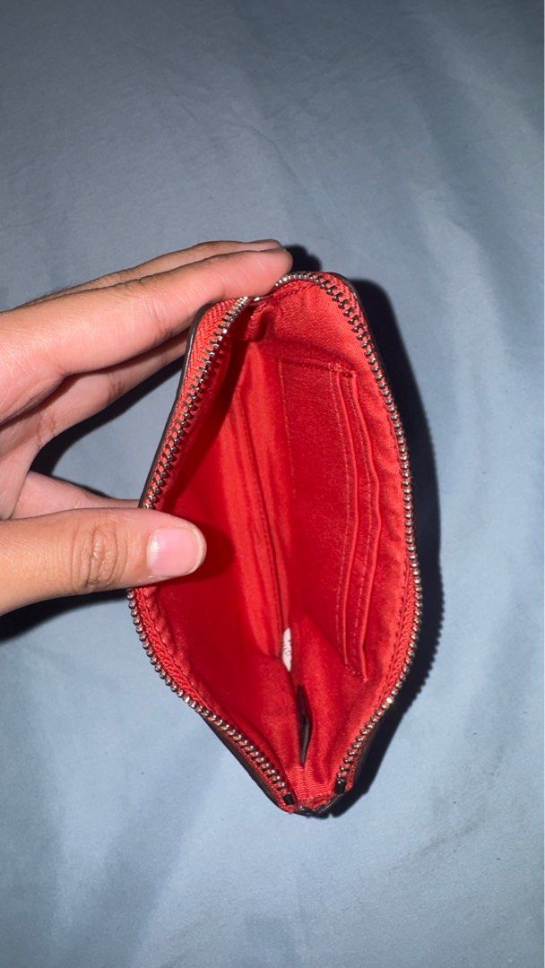 Coach Strawberry Print Wristlet (Category: Luxury Bags & Wallets) located in Manila. Submitted by declutterxvictoria (Listing ID 1416415523, Image 2). Description: Barely used .