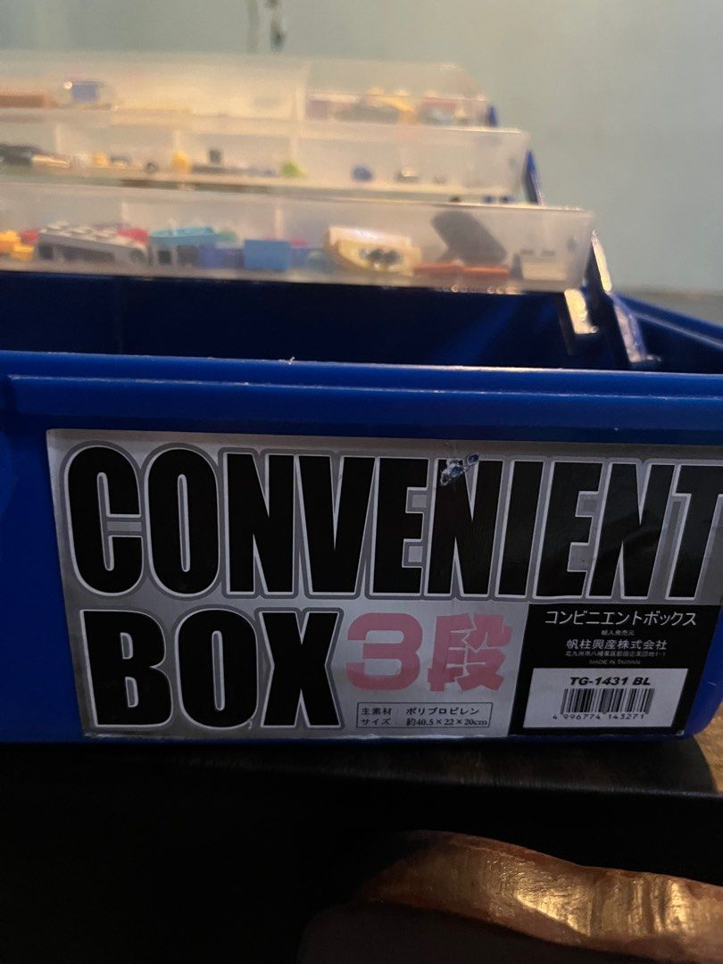 Convenient Box 3-Tier Storage Organizer tackle box (Category: Storage Boxes & Baskets) located in Pasay City. Submitted by beye01 (Listing ID 1416359881, Image 2). Description: 3-tier storage box, perfect for organizing small items. It has a blue base and a clear lid. The box has a handle for easy carrying. The dimensions are approximately 40.5cm x 22cm x 20cm. It is ideal for storing toys, tools, or other small items. The box is made of polyprop
