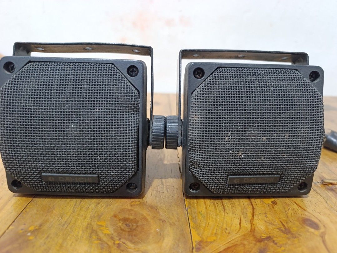 Daiichi Vintage Speakers with Mounting Brackets (Category: Soundbars, Speakers & Amplifiers) located in Quezon City. Submitted by yourstruly2018 (Listing ID 1416276528, Image 1). Description: - Black speakers with mesh covers - Includes mounting brackets - Features a connecting mechanism - Pre-attached wires for easy setup - Suitable for various audio setups - Speakers in good working condition.