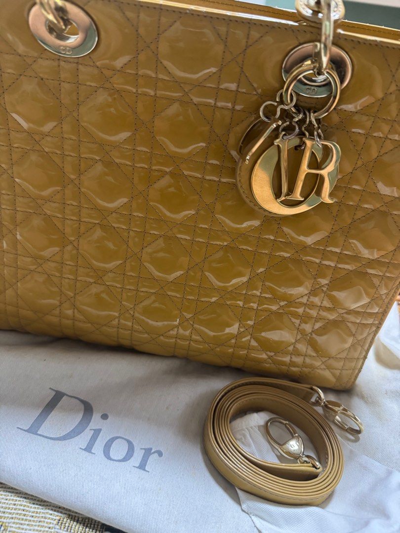 Dior Lady Dior Handbag (Category: Luxury Bags & Wallets) located in Taguig. Submitted by mhay.molina (Listing ID 1416232052, Image 2). Description: ALL MUST GO!!! LAST PRICE POSTED Authentic Dior Lady Dior – Large | Patent Leather | Pristine | Vintage 2003 For sale is an authentic Dior Lady Dior Large in yellow patent leather, featuring the iconic Cannage quilting and gold-tone D.I.O.R. charms. 📌 Details: • Brand: Christian Dior • Model: Lady Di