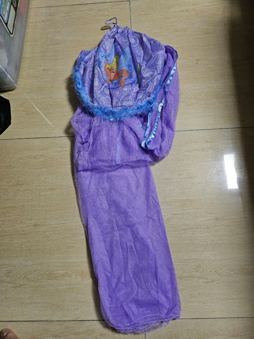 Disney Tinkerbell Bed Canopy (Category: Bedding & Towels) located in Makati City. Submitted by shopdoc (Listing ID 1416399722, Image 3). Description: - Disney Tinkerbell Canopy - Purple design with Tinkerbell graphics - Blue trim with feather accents - Made of durable polyester - Part of the Wonderful World of Disney collection.