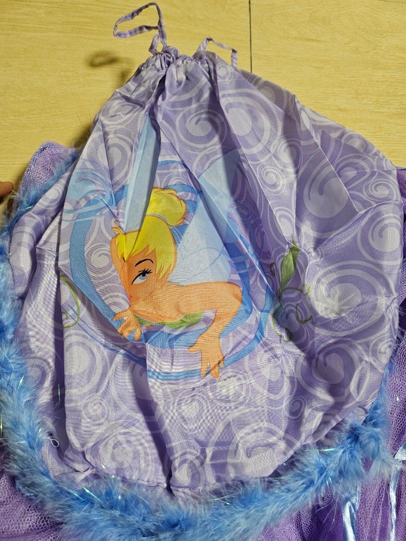 Disney Tinkerbell Bed Canopy (Category: Bedding & Towels) located in Makati City. Submitted by shopdoc (Listing ID 1416399722, Image 2). Description: - Disney Tinkerbell Canopy - Purple design with Tinkerbell graphics - Blue trim with feather accents - Made of durable polyester - Part of the Wonderful World of Disney collection.