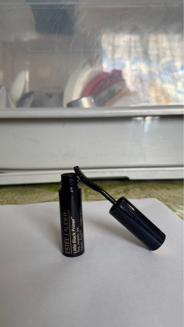 Estee Lauder Little Black Primer (Category: Makeup) located in Manila. Submitted by quickwind-fed6 (Listing ID 1416307953, Image 2). Description: - Estee Lauder Little Black Primer - Designed for use before mascara - Comes in a black tube - Brand name and product details are printed on the tube - Applicator is visible.