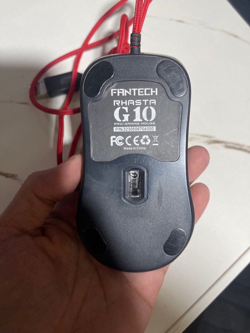 Fantech Rasta G10 Pro Gaming Mouse (Category: Mouse & Mousepads) located in Quezon City. Submitted by micoshoppe (Listing ID 1416328338, Image 2). Description: - Fantech Rasta G10 Pro Gaming Mouse - Sleek black body - Red braided cable - USB connector - Scroll wheel for easy navigation - Convenient side buttons - Features the Fantech logo.