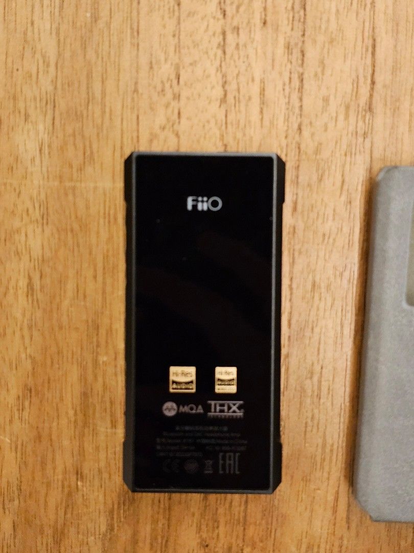 FiiO BTR7 Portable Bluetooth Receiver Amp DAC (Category: Portable Audio Accessories) located in Singapore. Submitted by fiddle (Listing ID 1416390209, Image 2). Description: Mint and like new condition. Used in my previous car for a couple of months and it always resided in the globe compartment. No idea for it now. cables are unused. Works perfectly - Like New FiiO BTR7 Bluetooth receiver - Supports LDAC and MQA for high-quality audio - Comes wi