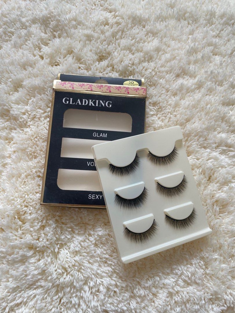 Gladking 3D Eyelashes - Glam, Volume, Sexy (Category: Makeup) located in Cavite. Submitted by soleiasafay (Listing ID 1416300356, Image 2). Description: 3 pairs of 3D Gladking false eyelashes ✨ • Styles: Glam, Volume, and Sexy • Comes in a black & gold box (note: box has a small dent) • Each pair is placed on a white tray RFS: Decluttering 📦 Delivery via Lalamove or Jnt 💸 Buyer shoulders shipping fee | Payment first (Gcash).
