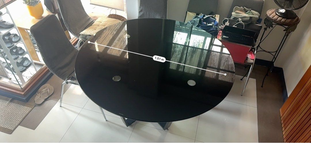 Glass table round with 6 pieces dining chair (Category: Tables & Sets) located in Taguig. Submitted by joyce.prelovedph (Listing ID 1416309428, Image 3). Description: Glass table with 6pcs dining chairs including the cover .