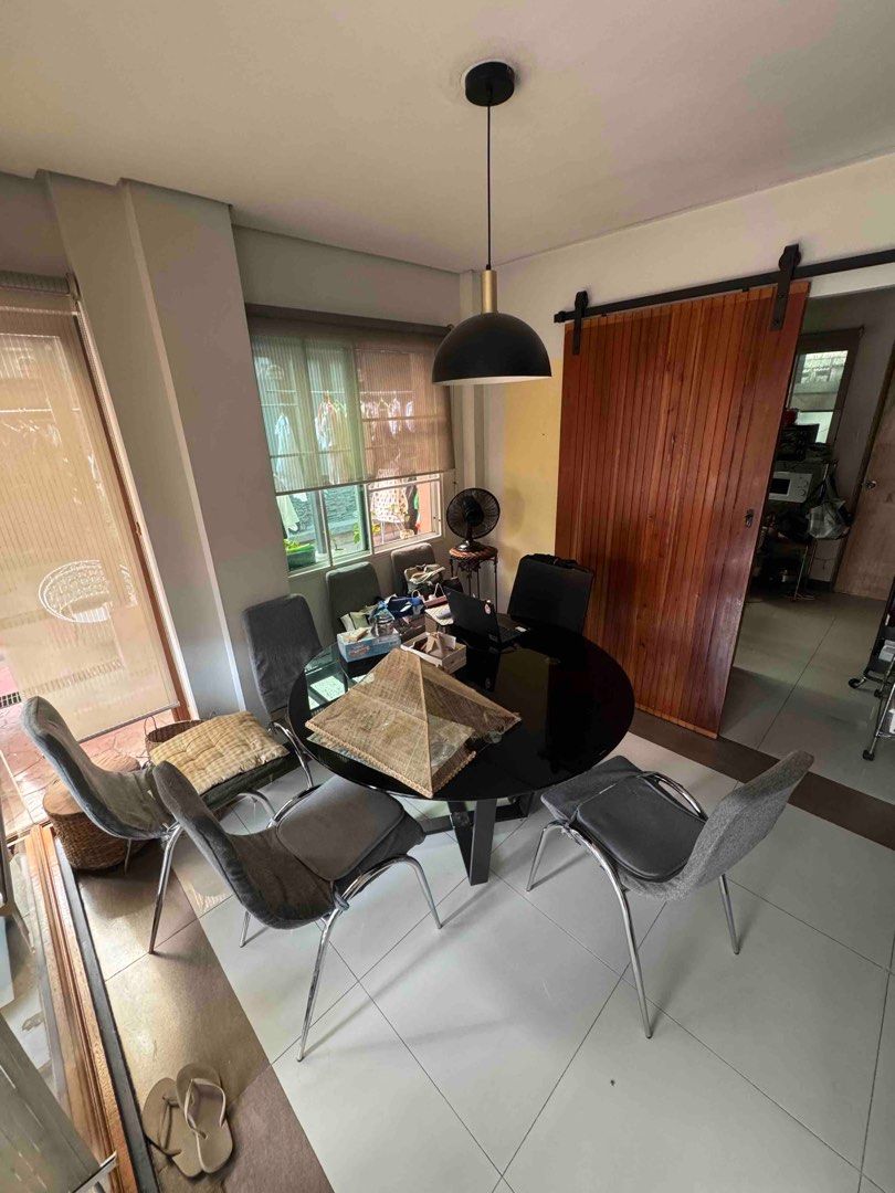 Glass table round with 6 pieces dining chair (Category: Tables & Sets) located in Taguig. Submitted by joyce.prelovedph (Listing ID 1416309428, Image 1). Description: Glass table with 6pcs dining chairs including the cover .