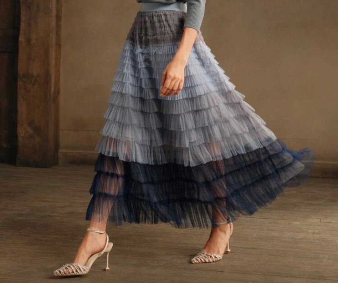 Gradient Tulle Maxi Skirt (Category: Skirts) located in Tanauan. Submitted by kdcstro (Listing ID 1416373951, Image 1). Description: - Brand new (never worn) - Ombre maxi skirt - Layered ruffle design - Gradient color effect (dark to light) - Flowing silhouette - Ideal for special occasions.