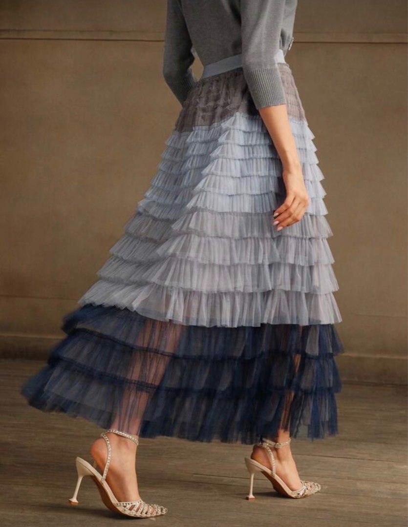 Gradient Tulle Maxi Skirt (Category: Skirts) located in Tanauan. Submitted by kdcstro (Listing ID 1416373951, Image 2). Description: - Brand new (never worn) - Ombre maxi skirt - Layered ruffle design - Gradient color effect (dark to light) - Flowing silhouette - Ideal for special occasions.