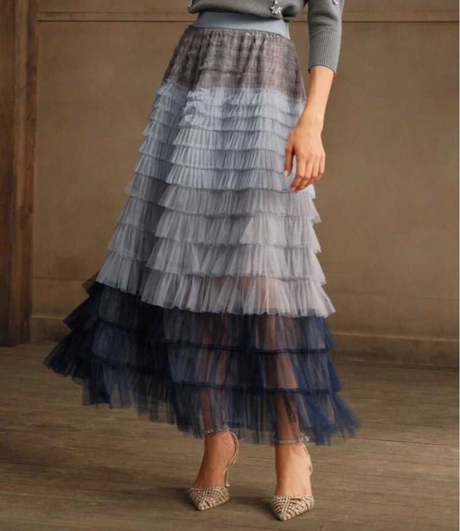 Gradient Tulle Maxi Skirt (Category: Skirts) located in Tanauan. Submitted by kdcstro (Listing ID 1416373951, Image 3). Description: - Brand new (never worn) - Ombre maxi skirt - Layered ruffle design - Gradient color effect (dark to light) - Flowing silhouette - Ideal for special occasions.