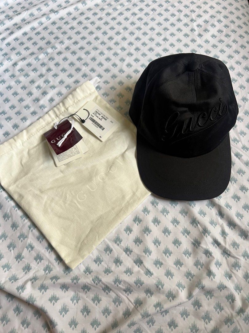 GUCCI logo-embroidered cotton baseball cap (Category: Luxury Accessories) located in Rizal. Submitted by ichaaay21 (Listing ID 1416275659, Image 2). Description: - Authentic Gucci baseball cap - Black color - Embroidered Gucci logo - Size M (58 cm) - Includes dust bag and tags - Made in Italy - Classic design - Bought in Spain.