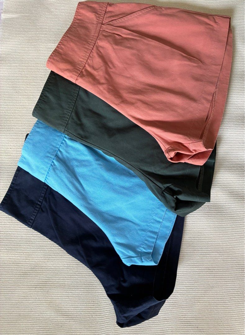 Pre-loved High-Waisted Shorts - Assorted Colors (Category: Shorts) located in San Pedro. Submitted by __reloop__ (Listing ID 1416221609, Image 1). Description: Pre-loved | very good condition | no issue | can fit 27-28 inches waist | 10 inches in length ₱60 each - Available in navy blue, light blue, dark green, and coral - High-waisted design - Features pleats and pockets - Perfect for a casual or dressed-up look - Versatile and stylish.