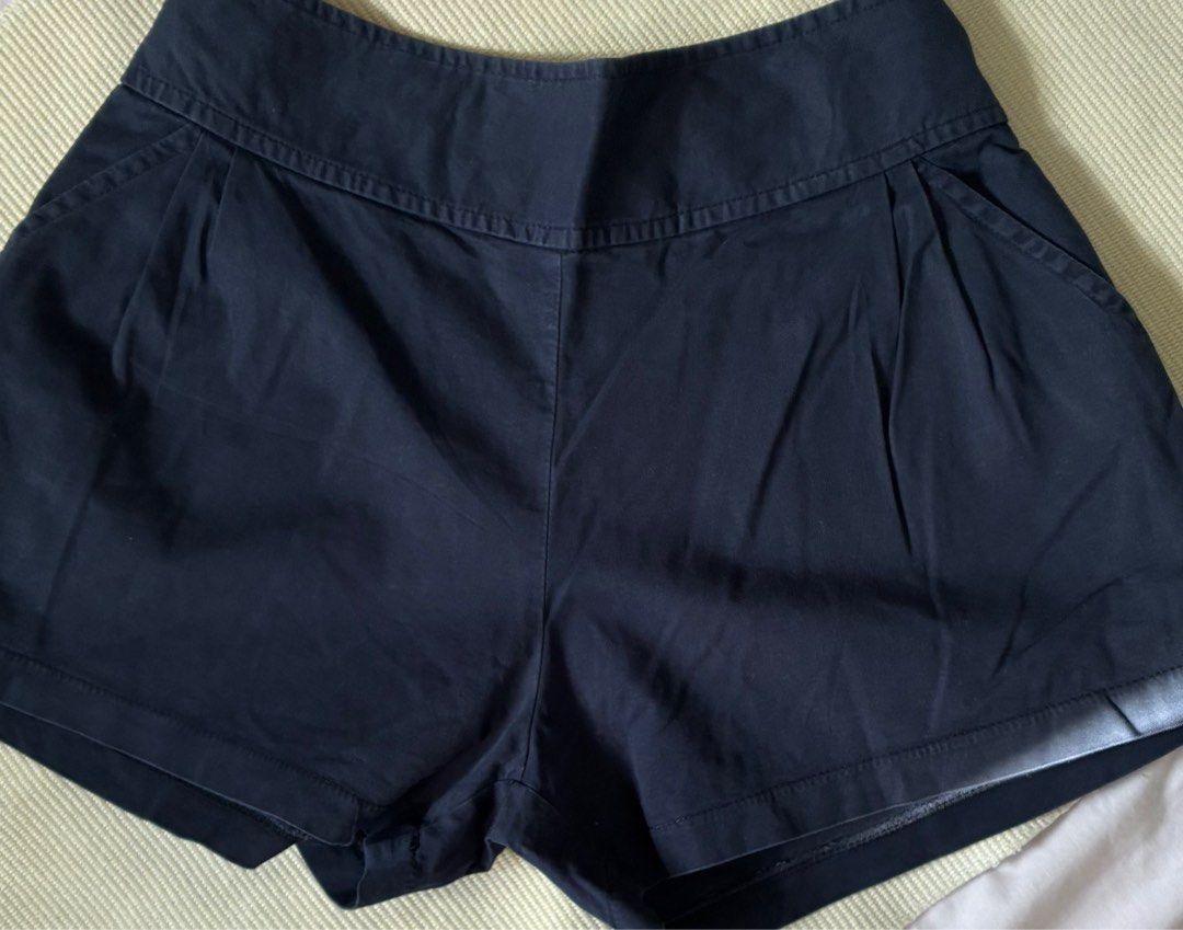 Pre-loved High-Waisted Shorts - Assorted Colors (Category: Shorts) located in San Pedro. Submitted by __reloop__ (Listing ID 1416221609, Image 2). Description: Pre-loved | very good condition | no issue | can fit 27-28 inches waist | 10 inches in length ₱60 each - Available in navy blue, light blue, dark green, and coral - High-waisted design - Features pleats and pockets - Perfect for a casual or dressed-up look - Versatile and stylish.