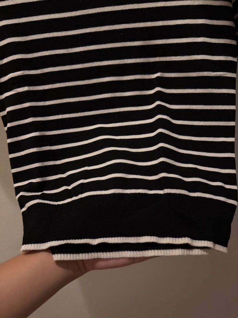 H&M Striped Crop Top - XS (Category: Sleeveless) located in Pasig City. Submitted by lovedstuff2020 (Listing ID 1416408277, Image 3). Description: - H&M crop top - Black and white stripes - Size: XS (best fits small-med m) - Features: Round neckline, short sleeves, white trim - Material: ribbed.