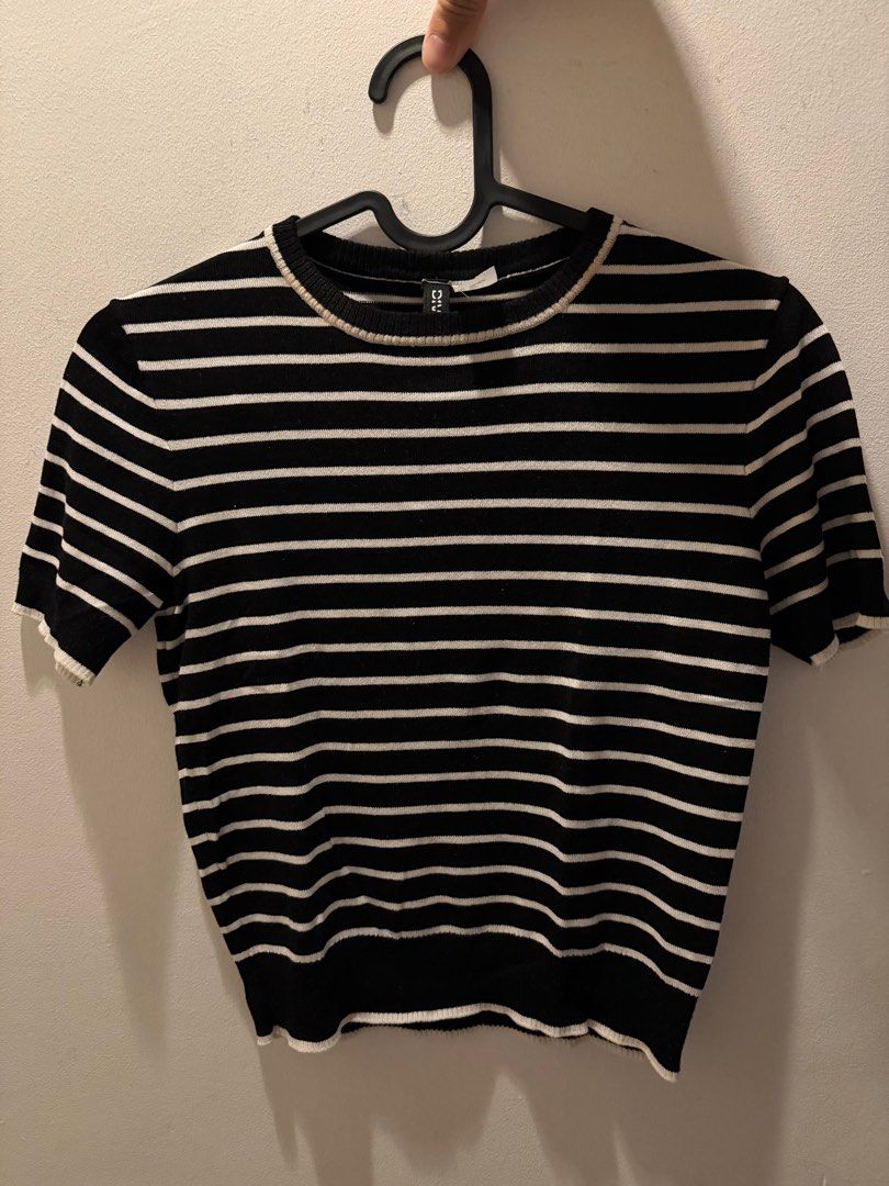 H&M Striped Crop Top - XS (Category: Sleeveless) located in Pasig City. Submitted by lovedstuff2020 (Listing ID 1416408277, Image 1). Description: - H&M crop top - Black and white stripes - Size: XS (best fits small-med m) - Features: Round neckline, short sleeves, white trim - Material: ribbed.