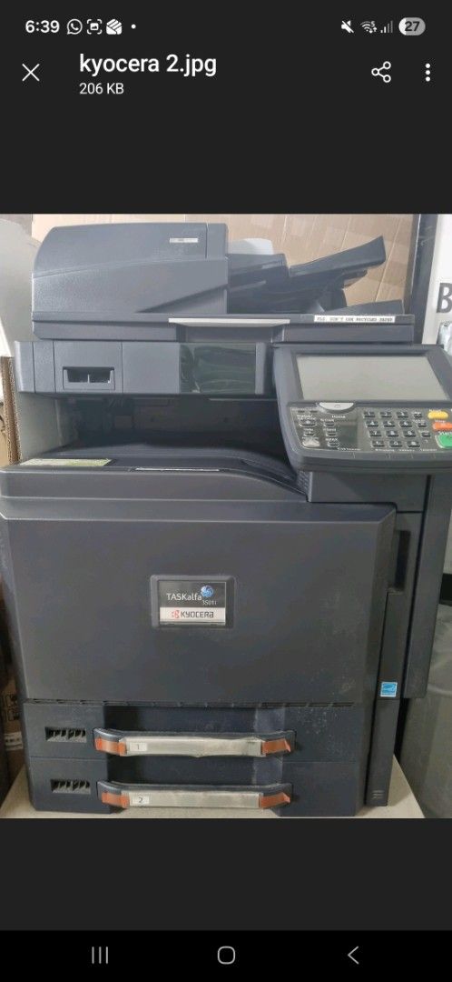 Kyocera Multifunction Printer (Category: Printers, Scanners & Copiers) located in Las Pinas. Submitted by naluzmicha89137 (Listing ID 1416344004, Image 1). Description: - Kyocera multifunction printer - Features a control panel with display and buttons - Includes paper trays - Functions: Copier, scanner, and printer - Color: Black - Brand: Kyocera - Purchased year 2017 - Unusable due to pulley assembly issue. - Being sold purely for scrap or for 