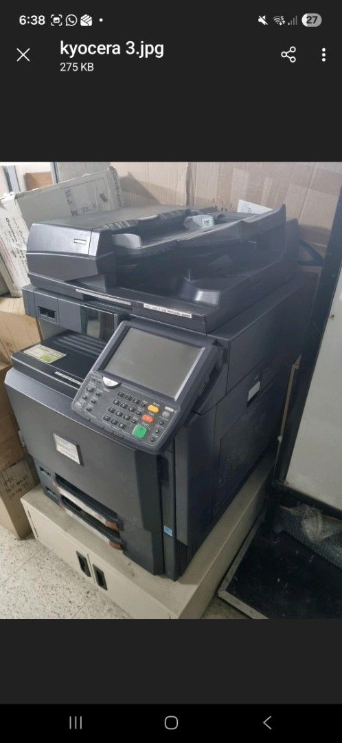 Kyocera Multifunction Printer (Category: Printers, Scanners & Copiers) located in Las Pinas. Submitted by naluzmicha89137 (Listing ID 1416344004, Image 3). Description: - Kyocera multifunction printer - Features a control panel with display and buttons - Includes paper trays - Functions: Copier, scanner, and printer - Color: Black - Brand: Kyocera - Purchased year 2017 - Unusable due to pulley assembly issue. - Being sold purely for scrap or for 