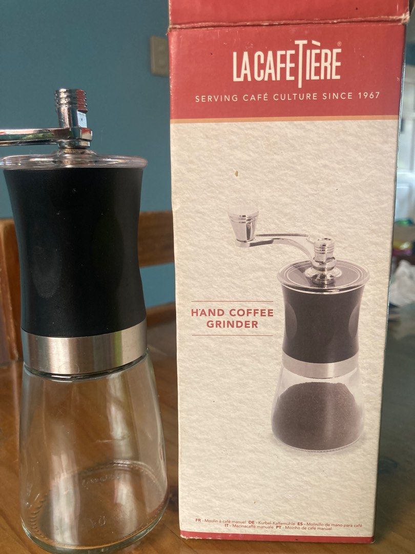 La Cafetiere Hand Coffee Grinder (Category: Coffee Machines & Makers) located in Antipolo. Submitted by ibskikayshop (Listing ID 1416253207, Image 3). Description: La Cafetiere hand coffee grinder features adjustable ceramic grinders for coarse, medium, or fine granules. It has an ergonomic design for easy manual grinding and a built-in glass jar. The box indicates it has been serving cafe culture since 1967..