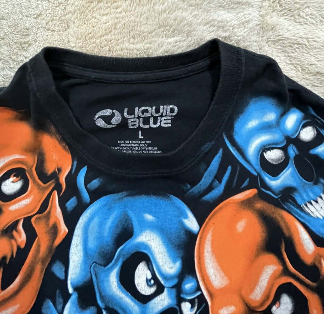 Liquid Blue Skull Pile Tricolor Tee (Category: Tshirts & Polo Shirts ) located in Romblon. Submitted by migustyles (Listing ID 1416409542, Image 2). Description: Liquid Blue Tricolor large in size OPT good condition.
