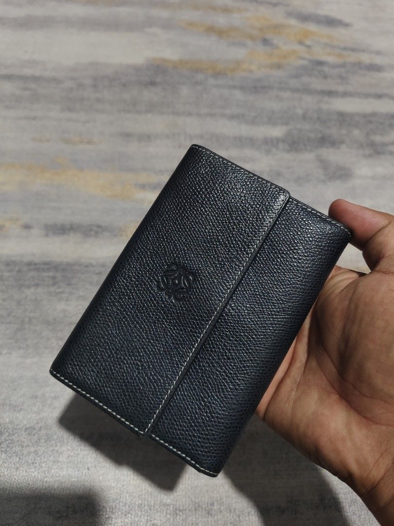 LOEWE TRIFOLD WALLET (Category: Luxury Bags & Wallets) located in Baguio. Submitted by igorotak.111.taraki.com (Listing ID 1416343348, Image 1). Description: FS LOEWE LEATHER TRIFOLD WALLET MADE IN SPAIN V.GOOD CONDITION NO ISSUES SOLID NITO ♥️ BOTH UNISEX.