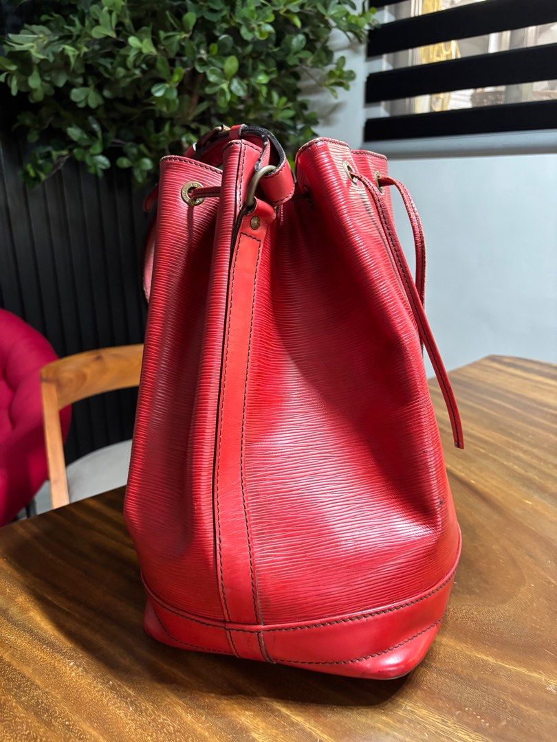 Louis Vuitton Epi Leather Bucket Bag (Category: Luxury Bags & Wallets) located in San Fernando. Submitted by mhedkm (Listing ID 1416252423, Image 3). Description: Guaranteed authentic, GM size. Very rare. Signs of usage only. .