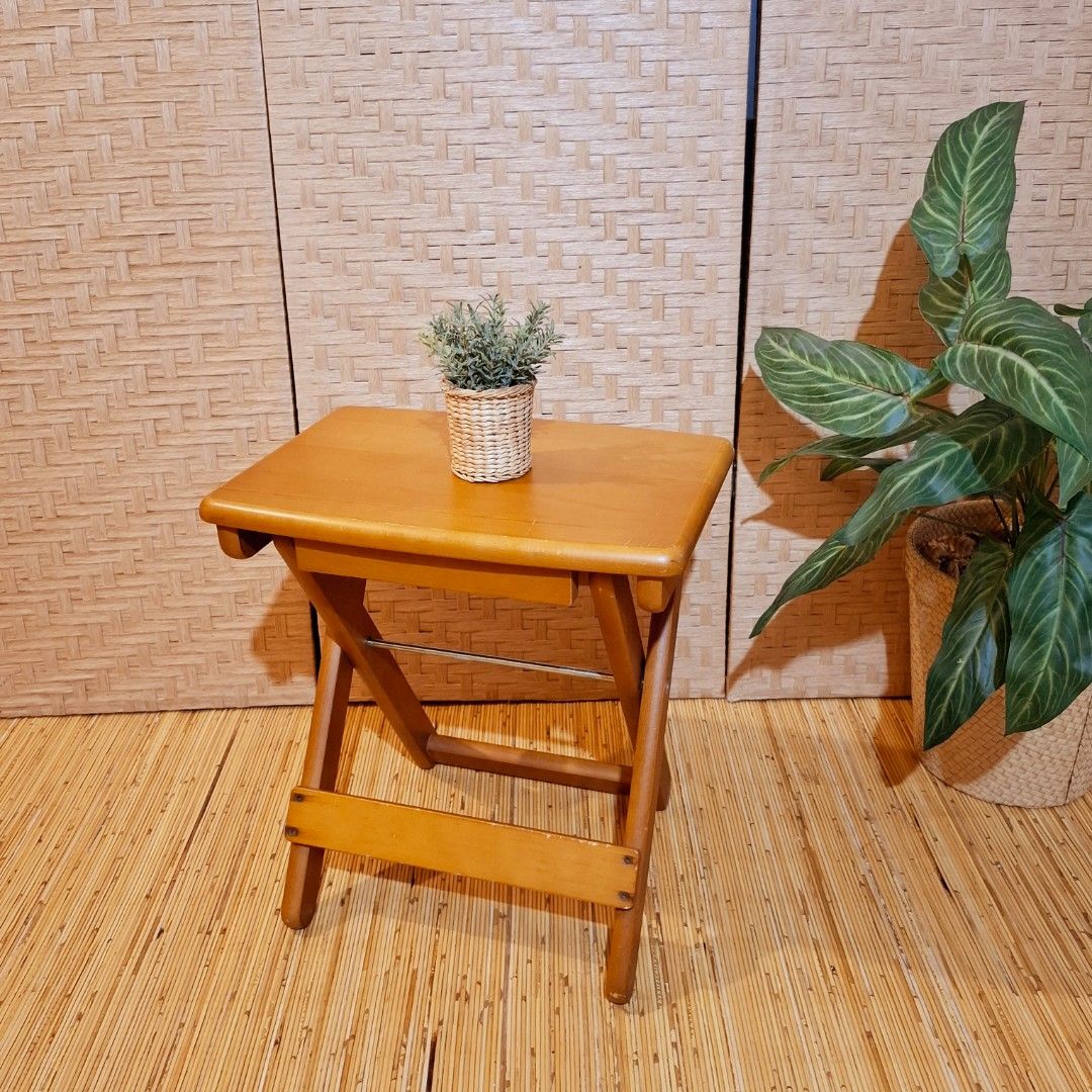 Mini solid wood folding table side table (Category: Tables & Sets) located in Dasmarinas. Submitted by millennialmeetsvintage (Listing ID 1416353504, Image 1). Description: H 43 x L 40 x W 28 cm super cute small folding side table solid wood sturdy and durable folds flat for easy storage portable last price posted no haggling 🙅‍♀️ 📌shipping via lalamove only 📌no reservations, first-to-pay basis 📌no physical store, no walk-ins 📌ships from DAS