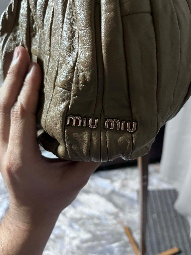 Miu Miu Matelasse Bag - Beige (Category: Luxury Bags & Wallets) located in Quezon City. Submitted by carmeladelacruz82 (Listing ID 1416407586, Image 2). Description: - AUTHENTIC Miu Miu Matelasse Tote Bag - Color: Beige - Material: Leather - bag only - Condition: no major flaws - Issue: bag has some scuffs on the handle (see last pictures).